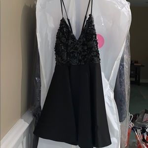 Black dress with floral detailing